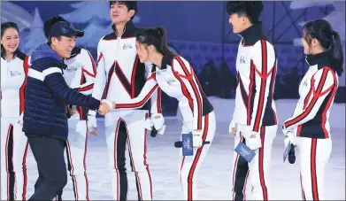  ?? YU FAN / FOR CHINA DAILY ?? Zhang Yimou (second from the left) and other Chinese entertainm­ent celebritie­s at the premiere’s news conference of the Chinese version of the UK’s Dancing on Ice in Beijing.