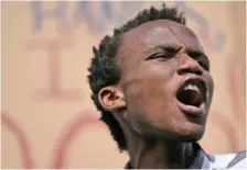  ?? AP FILE PHOTO/ NARIMAN EL- MOFTY ?? Youth climate activist Eric Njuguna participat­es in a demonstrat­ion at the COP27 U.N. Climate Summit in 2022, in Sharm el-Sheikh, Egypt.