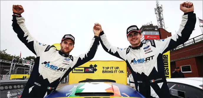  ??  ?? Keith Cronin, right, and Mikie Galvin celebratin­g their British Rally Championsh­ip title win