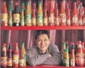  ??  ?? ■ Owner of the Pou Chong brand, Dominic Lee at his shop at Tiretta Bazaar, the first Chinatown. A combinatio­n of the Pou Chong tomato sauce and Pou Chong green chilli sauce is usually used with the Kolkata kathi roll.