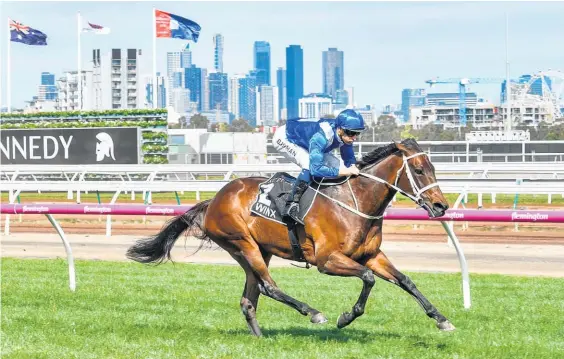  ?? Getty Images ?? Champion mare Winx extends her winning streak to 21 with an effortless victory in the Turnbull Stakes at Flemington yesterday.