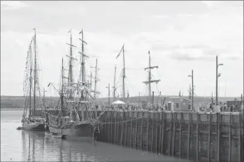  ?? SARA ERICSSON ?? The Bluenose II, left, and the Picton Castle sit docked at the Digby Wharf during the first day of the Digby Rendez-vous 2017 Tall Ships Regatta.