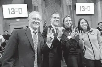  ?? Mel Melcon Los Angeles Times ?? CITY COUNCILMAN Paul Krekorian, left, Mayor Eric Garcetti and former Olympians Angela Ruggiero and Janet Evans give the go-ahead signal for the 2024 Summer Olympics.