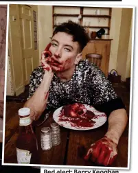  ?? ?? Red alert: Barry Keoghan in the vampire-inspired magazine shoot complete with apparent victim, below