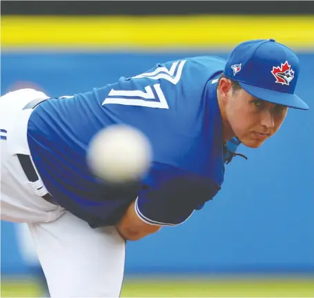  ?? KIM KLEMENT/USA TODAY SPORTS FILES ?? The Blue Jays’ top pitching prospect, Nate Pearson, announced his arrival in Toronto to begin MLB’S summer camp on Instagram. When the rest of the Jays will join him remains to be seen after about a dozen were held back in Florida because of COVID-19.