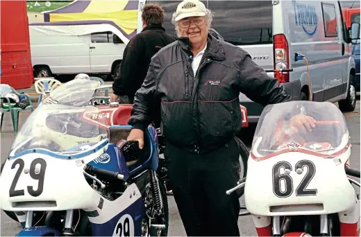  ??  ?? Rob North poses with two of his creations, a Triumph and a BSA triple.