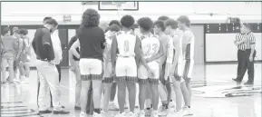  ?? HERALD photos/Dustin Pope ?? The Big Spring Steers huddle before heading back out on the court to face off against Sweetwater. Pictured at right: Keegan Mitchell drives to the basket in Saturday’s game.