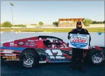 ??  ?? Dustin DeRosier led 31 laps of the North State Modified Series feature race after an earlier win in the Lucas Oil Dash for Cash.