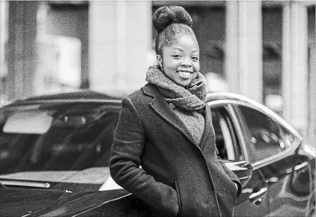  ?? CHRIS YOUNG THE CANADIAN PRESS ?? Aisha Addo, founder of DriveHer, a ride-hailing service for women, stands by a car in Toronto on Saturday.