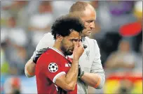  ?? Picture: REUTERS ?? CRUSHED: Liverpool’s Mohamed Salah looks dejected as he is substitute­d during the Champions League final against Real Madrid