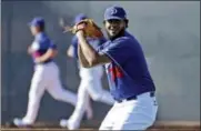 ?? THE ASSOCIATED PRESS FILE ?? Los Angeles Dodgers closer Kenley Jansen throws during a spring training workout.