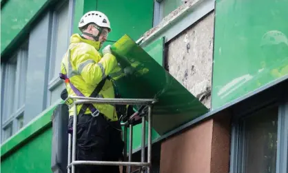  ?? Photograph: Danny Lawson/PA ?? Cladding being removed from Hanover tower block in Sheffield, Yorkshire.