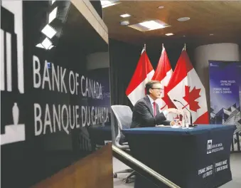  ?? BLAIR GABLE/REUTERS FILES ?? In his news conference Thursday, Bank of Canada governor Tiff Macklem addressed income inequality in his remarks about recessions and touched on the need to tackle climate change.