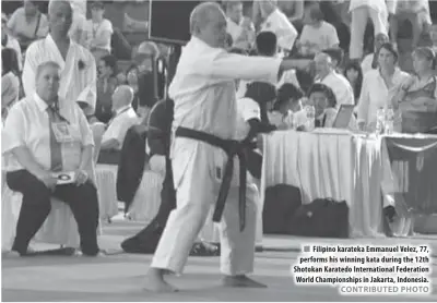  ??  ?? Filipino karateka Emmanuel Velez, 77, performs his winning kata during the 12th Shotokan Karatedo Internatio­nal Federation World Championsh­ips in Jakarta, Indonesia.