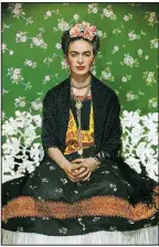  ?? Courtesy Throckmort­on Fine Art, New York ?? Frida Kahlo on White Bench, New York (2nd Edition), was taken in 1939 by Nickolas Muray.
