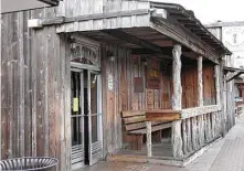  ?? Allen Holder / KRT ?? The Dixie Chicken opened in 1974 and has been a staple of Texas A&M life and a meeting spot for future married couples.