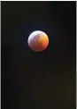  ?? COURTESY OF BRANDON JOKE ?? This file photo shows a picture of a blood moon, otherwise known as a lunar eclipse.