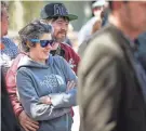  ??  ?? Filmmaker Sarah Fleming (left) and artist Christophe­r Reyes join members of the Memphis creative community for a rally in support of the couple who have been evicted from their downtown condominiu­m. JIM WEBER/THE COMMERCIAL APPEAL