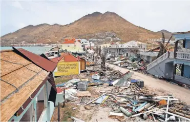  ?? CHRISTOPHE ENA, AP ?? Hurricane Irma laid waste to many of the buildings on the Caribbean island of St. Martin.