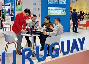  ?? Photos by Yu Xiangjun ?? Uruguay’s exhibition area at the Country Pavilion of the first China Internatio­nal Import Expo held in November 2018 in Shanghai.