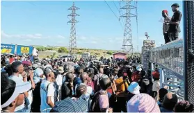  ?? ?? TAKING A STAND: At least 200 students from PE TVET College’s Iqhayiya campus protest yesterday to get the attention of NSFAS and college officials