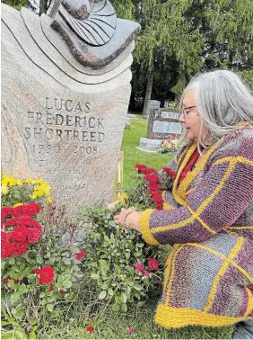  ?? JON WELLS METROLAND ?? Above, Lucas Shortreed’s mother, Judie Moore, tends to his stone in a cemetery in Fergus last October.