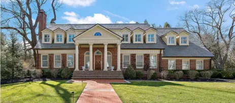  ?? Roseanne Martin/Pennsylvan­ia Real Estate Photograph­y photos ?? Mitch Trubisky’s house at 515 Maple Lane in Edgeworth is priced at $1.9 million.