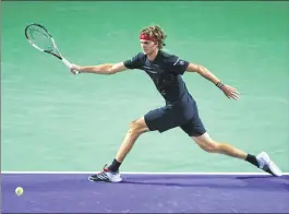  ??  ?? Alexander Zverev plays a forehand against Borna Coric in their quarterfin­al match during the Miami Open.