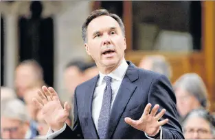  ?? CP PHOTO ?? Finance Minister Bill Morneau speaks during question period in the House of Commons on Parliament Hill, in Ottawa on Tuesday.