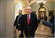  ?? AP PHOTO BY J. SCOTT APPLEWHITE ?? Senate Majority Leader Mitch Mcconnell, R-KY., walks from the chamber to his office as the GOP overhaul of the tax bill nears a vote, on Capitol Hill in Washington, Friday.