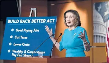  ?? J. SCOTT APPLEWHITE/AP ?? House Speaker Nancy Pelosi discusses the Build Back Better Act during a news conference Thursday.