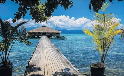  ?? PHOTOS: TNS ?? Base camp . . . Fatboys Resort on Mbambanga Island is built over deep water to accommodat­e boats and to protect coral near the shore, encourages guests to relax, or if absolutely necessary, sample the scuba, snorkeling, fishing and village walks.