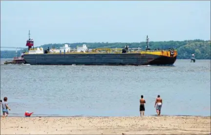  ?? FILE PHOTO BY TONY ADAMIS ?? A large vessel on the Hudson River passes Kingston Point Beach in August 2016.