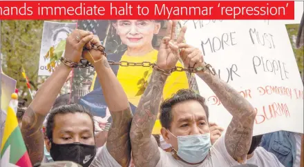  ?? Photo: Nampa/AFP ?? Protest… Myanmar migrants in Thailand hold up the three finger salute and a picture of detained Myanmar civilian leader Aung San Suu Kyi at a protest against the military coup in their home country.