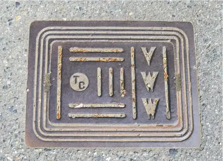  ?? PHOTOS: JOHN MACKIE ?? A water works grate bearing the Terminal City Iron Works stamp is located at Vernon Drive and Keefer streets.