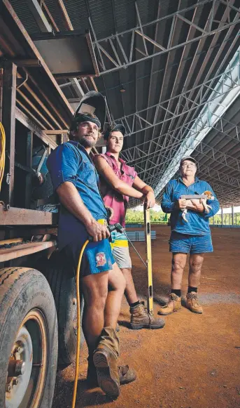  ?? Picture: MICHAEL FRANCHI ?? Massey Taylor, Daniel Stewart, and Willie Taylor, from Taylor's Fencing are building the new stock yards under the recently completed shelter at the Berrimah export yards