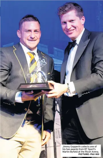  ??  ?? Jimmy Gopperth collects one of his two awards from BT Sport’s Martin Byfield at the Ricoh Arena.