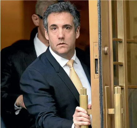  ?? AP ?? Michael Cohen, former personal lawyer to President Donald Trump, leaves Federal court yesterday in New York. Cohen has pleaded guilty to charges including campaign finance fraud stemming from hush money payments to porn actress Stormy Daniels and ex-playboy model Karen Mcdougal.