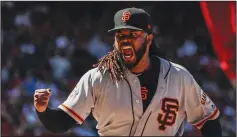  ?? ROBERT GAUTHIER/TRIBUNE NEWS SERVICE ?? Giants pitcher Johnny Cueto exults after inducing a double play against the Los Angeles Angels on April 28, 2018.