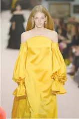  ??  ?? MElLOW YELLOW: A model walks the runway for Carolina Herrera during New York Fashion Week on Sept. 10.