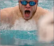  ?? PILOT PHOTO/RUSTY NIXON ?? Plymouth’s Joe Cartwright catches his breath on his way to winning the 100 breast stroke on Senior Night at Plymouth.