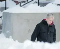  ?? ANDREW VAUGHAN / THE CANADIAN PRESS ?? Dennis Oland heads to the Law Courts in Saint John, N.B., on Wednesday. He’s being tried before a judge alone in the death of his millionair­e father, Richard Oland.