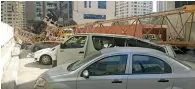  ??  ?? The accident site where a crane at an under-constructi­on building in Tourist Club area of Abu Dhabi collapsed on Monday.