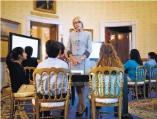  ?? TOM BRENNER/NEW YORK TIMES FILE PHOTO ?? U.S. Education Secretary Betsy DeVos speaks to students during a listening session on school issues at the White House in April. The Education Department is considerin­g whether to allow states to use federal funding to purchase guns for educators, according to multiple people with knowledge of the plan.