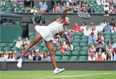  ?? ALBERTO PEZZALI/AP ?? Coco Gauff serves to Russia’s Elena Vesnina during their women’s singles second round match on Thursday in London.