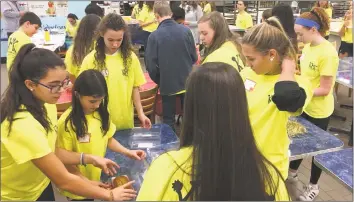  ?? Contribute­d Photo ?? Members of Kids Helping Kids during their annual bread bake at Shop Rite Grade A in Stamford.