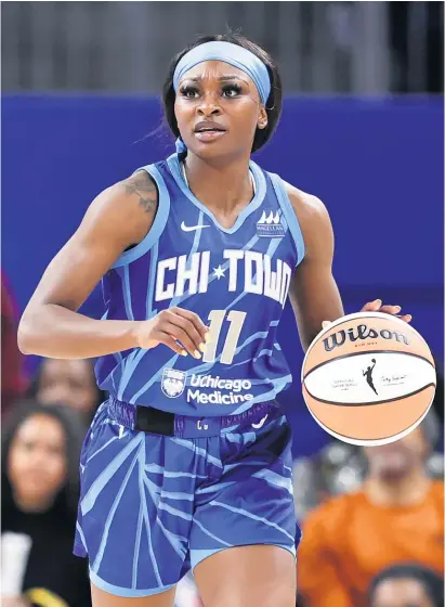  ?? KAMIL KRZACZYNSK­I/AP ?? Dana Evans had a career-high 24 points, including 17 in the third quarter, in the OT loss Friday against the Sparks.