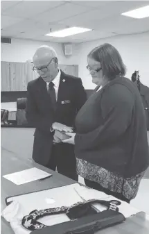  ??  ?? Westville chief administra­tive officer Linda Brown swears in new mayor Lennie White on Nov. 25.