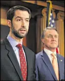  ?? MARK WILSON/ GETTY IMAGES ?? Sen. Tom Cotton, R-Arkansas, and Sen. David Perdue, R-Georgia, unveiled legislatio­n aimed at limiting green cards.