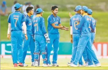  ?? GETTY ?? Prithvi Shawled India U19 strengthen­ed their chances of making it to the knockouts by defeating Australia U19 by 100 runs.